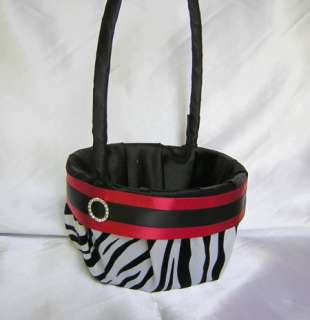 THIS BLACK SATIN AND BLACK AND WHITE ZEBRA GUEST BOOK IS ADORNED WITH 