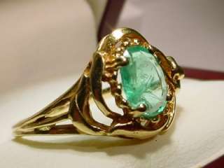   gold lovely ornate Genuine Emerald womes ring 1 dollar and Go  