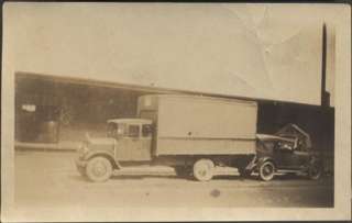 Photo 1920s Moving Truck Backs Into Touring Car 515929  