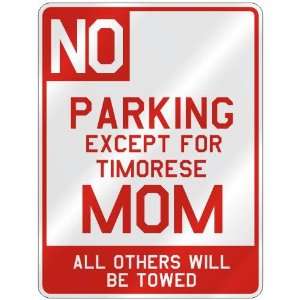 NO  PARKING EXCEPT FOR TIMORESE MOM  PARKING SIGN COUNTRY EAST TIMOR