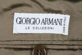 Thisis an AWESOME vintage blazer by Giorgio Armani. It is a tanish 