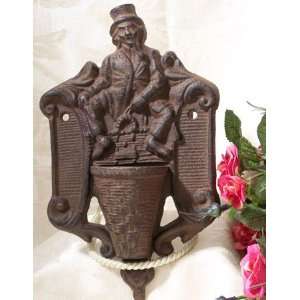 CAST IRON MATCH HOLDER * MAN WITH PIPE:  Home & Kitchen