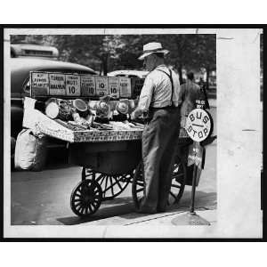   his pushcart,New York City,NYC,NY,1947,Bus Stop,vendor