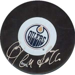  Glen Sather autographed Hockey Puck (Edmonton Oilers 
