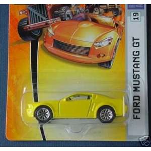   2006 1:64 Scale Yellow Ford Mustang GT Die Cast Car #19: Toys & Games