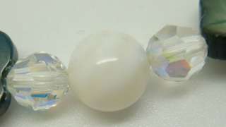 12MM MOTHER OF PEARL SHELL BEADS , 6MM SWAROVSKI BEADS , AND 8MM WHITE 