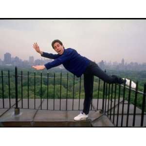 Comedian Jerry Seinfeld Acting Silly on His Apartment Building Rooftop 
