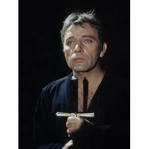 Actor Richard Burton Gripping Hilt of Sword During Scene from Hamlet 