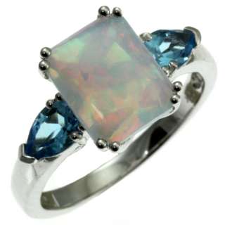 10k white gold opal and blue topaz ring  